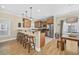 Well-equipped kitchen featuring stainless steel appliances, breakfast bar, and dining area at 132 Garden City Retreat Dr., Murrells Inlet, SC 29576