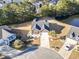 Beautiful aerial view of a brick home with a well-manicured lawn and landscaping at 1412 Rainsbrook Ct., Conway, SC 29526