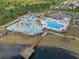Aerial view of community amenities including a pool, lazy river, playground, and clubhouse at 1414 Villena Dr., Myrtle Beach, SC 29579