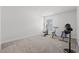 Versatile bonus room with exercise equipment and ample space for a home gym or recreational area at 1414 Villena Dr., Myrtle Beach, SC 29579