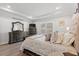 Large main bedroom featuring a bed, dresser, nightstands, and hardwood floors at 1414 Villena Dr., Myrtle Beach, SC 29579
