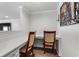 Functional office nook with built-in desks, chairs, and natural light at 1414 Villena Dr., Myrtle Beach, SC 29579