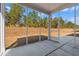 Relaxing screened porch with views of the grassy lawn at 1414 Villena Dr., Myrtle Beach, SC 29579