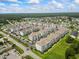 Aerial view of a residential community with multiple condo buildings, landscaping, and parking areas at 181 Ella Kinley Circle # 305, Myrtle Beach, NY 29588