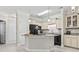 Modern kitchen with granite island, stainless steel appliances, and ample cabinet space at 181 Ella Kinley Circle # 305, Myrtle Beach, NY 29588
