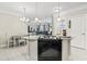 Open-concept layout with kitchen island, dining, and living spaces at 181 Ella Kinley Circle # 305, Myrtle Beach, NY 29588
