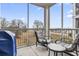 Relaxing screened porch with outdoor seating and a view of the open landscape at 181 Ella Kinley Circle # 305, Myrtle Beach, NY 29588