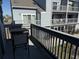 Cozy balcony with outdoor seating, perfect for relaxing and enjoying the neighborhood view at 1890 Colony Dr. # 17T, Surfside Beach, SC 29575