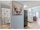 Hallway view of the full bathroom with shower and entry to living room area at 1890 Colony Dr. # 17T, Surfside Beach, SC 29575
