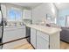 Bright kitchen with white cabinetry, and breakfast bar at 1890 Colony Dr. # 17T, Surfside Beach, SC 29575