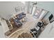 Bright, open living room featuring hardwood floors, high ceilings, comfortable seating, and a private balcony at 1890 Colony Dr. # 17T, Surfside Beach, SC 29575