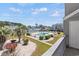 Inviting community pool with manicured landscaping, lounging area, and clear blue sky views at 1890 Colony Dr. # 17T, Surfside Beach, SC 29575