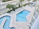 Aerial view of the large pool and hot tub surrounded by ample lounge chairs and green landscaping at 2000 S Ocean Blvd. # V401 A&B, Myrtle Beach, SC 29577