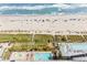 Stunning aerial view of beach with pools and lounge area at 2007 S Ocean Blvd. # 2006, Myrtle Beach, SC 29577