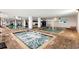 Beautiful indoor pools surrounded by brick tile flooring and columns at 2007 S Ocean Blvd. # 2006, Myrtle Beach, SC 29577