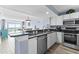 This open concept kitchen features bar seating and modern appliances at 2007 S Ocean Blvd. # 2006, Myrtle Beach, SC 29577