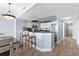 The kitchen features white cabinets and stainless steel appliances at 2007 S Ocean Blvd. # 2006, Myrtle Beach, SC 29577