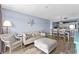 The living area connects to the dining room and boasts a coastal aesthetic at 2007 S Ocean Blvd. # 2006, Myrtle Beach, SC 29577