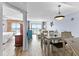 Open-concept condo featuring an ocean view, a living room, a dining room and a bedroom at 2007 S Ocean Blvd. # 2006, Myrtle Beach, SC 29577