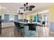 Spacious kitchen featuring a large island with barstool seating and modern appliances at 2201 S Waccamaw Dr., Murrells Inlet, SC 29576