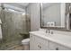 Bathroom featuring a glass shower, a vanity with a mirror, and a toilet at 2323 Tidewatch Way, North Myrtle Beach, SC 29582