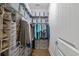 Custom closet system with shelves, drawers, and hanging rods offers ample storage space at 2323 Tidewatch Way, North Myrtle Beach, SC 29582