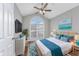 Comfortable bedroom with vaulted ceiling and a beautiful arched window for natural light at 2623 Corn Pile Rd., Myrtle Beach, SC 29588