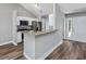 Modern kitchen featuring stainless steel appliances and a breakfast bar at 2623 Corn Pile Rd., Myrtle Beach, SC 29588