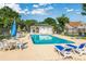 Community pool featuring lounge chairs, tables, and a covered seating area at 2623 Corn Pile Rd., Myrtle Beach, SC 29588