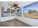 Relaxing screened porch with ceiling fan overlooking the fenced backyard at 2623 Corn Pile Rd., Myrtle Beach, SC 29588