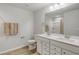 Bright bathroom featuring double sink vanity, tile flooring, and shower-tub combo at 2652 Ellesmere Circle, Myrtle Beach, SC 29579