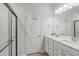 Bathroom showcasing a dual sink vanity and glass enclosed shower at 2652 Ellesmere Circle, Myrtle Beach, SC 29579
