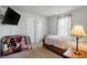 Bedroom with a queen bed, tv on the wall and neutral-colored carpet at 2652 Ellesmere Circle, Myrtle Beach, SC 29579
