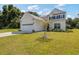 Charming two-story home featuring a well-manicured lawn and attached two-car garage at 2652 Ellesmere Circle, Myrtle Beach, SC 29579