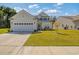 Attractive two-story home with a two-car garage and verdant lawn at 2652 Ellesmere Circle, Myrtle Beach, SC 29579