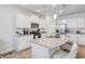 Modern kitchen with white cabinets, granite countertops, and stainless steel appliances at 2652 Ellesmere Circle, Myrtle Beach, SC 29579