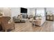 Comfortable living room featuring neutral tones and hardwood floors at 2652 Ellesmere Circle, Myrtle Beach, SC 29579