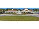 Beautiful community pool area with lush landscaping and pristine buildings showcasing a resort-like experience at 308 Starlit Way, Myrtle Beach, SC 29579