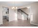 Bright dining area with staircase featuring a view of the modern kitchen at 308 Starlit Way, Myrtle Beach, SC 29579