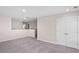 A loft space with a view of the staircase and plush carpet at 308 Starlit Way, Myrtle Beach, SC 29579