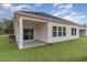 This covered patio offers great space for outdoor seating and entertaining at 3087 Dover Branch Dr., Little River, SC 29566