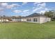 A beautiful manicured lawn surrounds the back of this new construction home in a quiet neighborhood at 3087 Dover Branch Dr., Little River, SC 29566