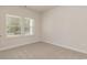This cozy bedroom features neutral carpet and dual windows for plenty of natural light at 3087 Dover Branch Dr., Little River, SC 29566