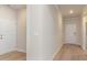 This hallway is light and bright with wood look floors and white trim and molding at 3087 Dover Branch Dr., Little River, SC 29566