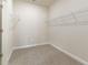 Walk-in closet featuring carpeted floors and shelves for optimal storage at 3087 Dover Branch Dr., Little River, SC 29566