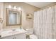 Cozy bathroom with a vanity, toilet and shower curtain at 3736 Brookhill Dr., Myrtle Beach, SC 29588