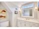 Bathroom with a white vanity, toilet, and artwork on the wall at 3736 Brookhill Dr., Myrtle Beach, SC 29588