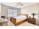 Comfortable bedroom with a bed, dresser, and natural lighting at 3736 Brookhill Dr., Myrtle Beach, SC 29588