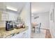 Coffee bar area with granite countertops and coffee syrups and coffee maker at 3736 Brookhill Dr., Myrtle Beach, SC 29588