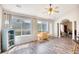 This dining space features lots of light, views of the backyard, and hardwood floors at 3736 Brookhill Dr., Myrtle Beach, SC 29588